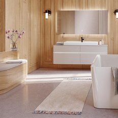 Das Badezimmer zeigt eine stilvolle Kombination aus Holz und Weiß, mit einer großen Spiegelfläche und sanfter Beleuchtung für Gemütlichkeit.